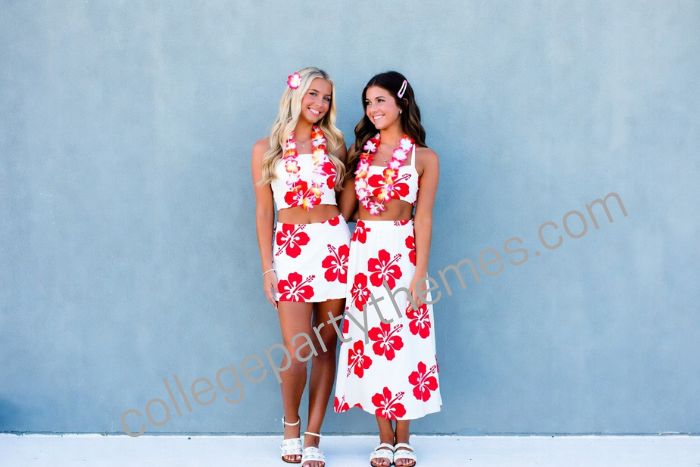 College girl wearing matching floral two piece tropical set crop top skirt flower lei luau party