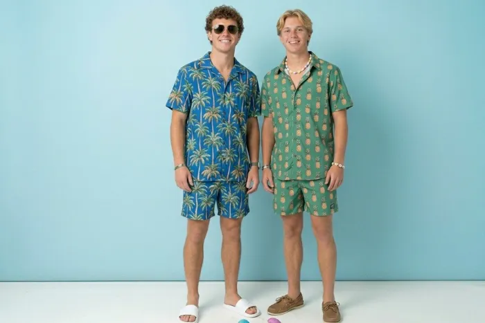 Guys beach party outfit matching tropical set blue palm tree green pineapple print shirt shorts white slides boat shoes  